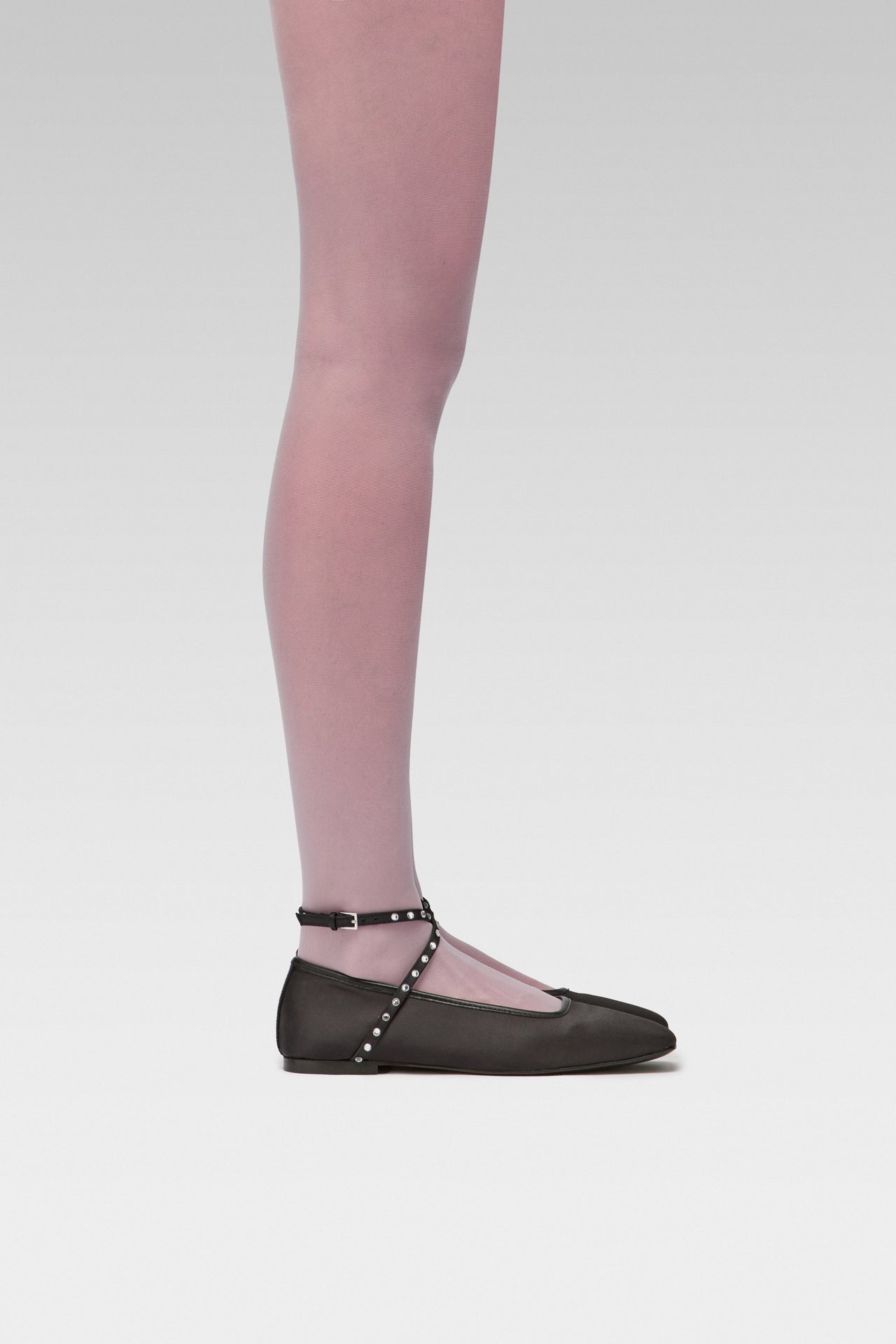Galaxy Lilac tights Crafted from a silky 20 denier finish, the Galaxy Tights feature a sheer body, shaped silhouette, and invisible toe with EDLA Saturn Ballet black flats Crafted from satin, the Saturn Ballet Flat features crystal-embellished straps and a squared toe.