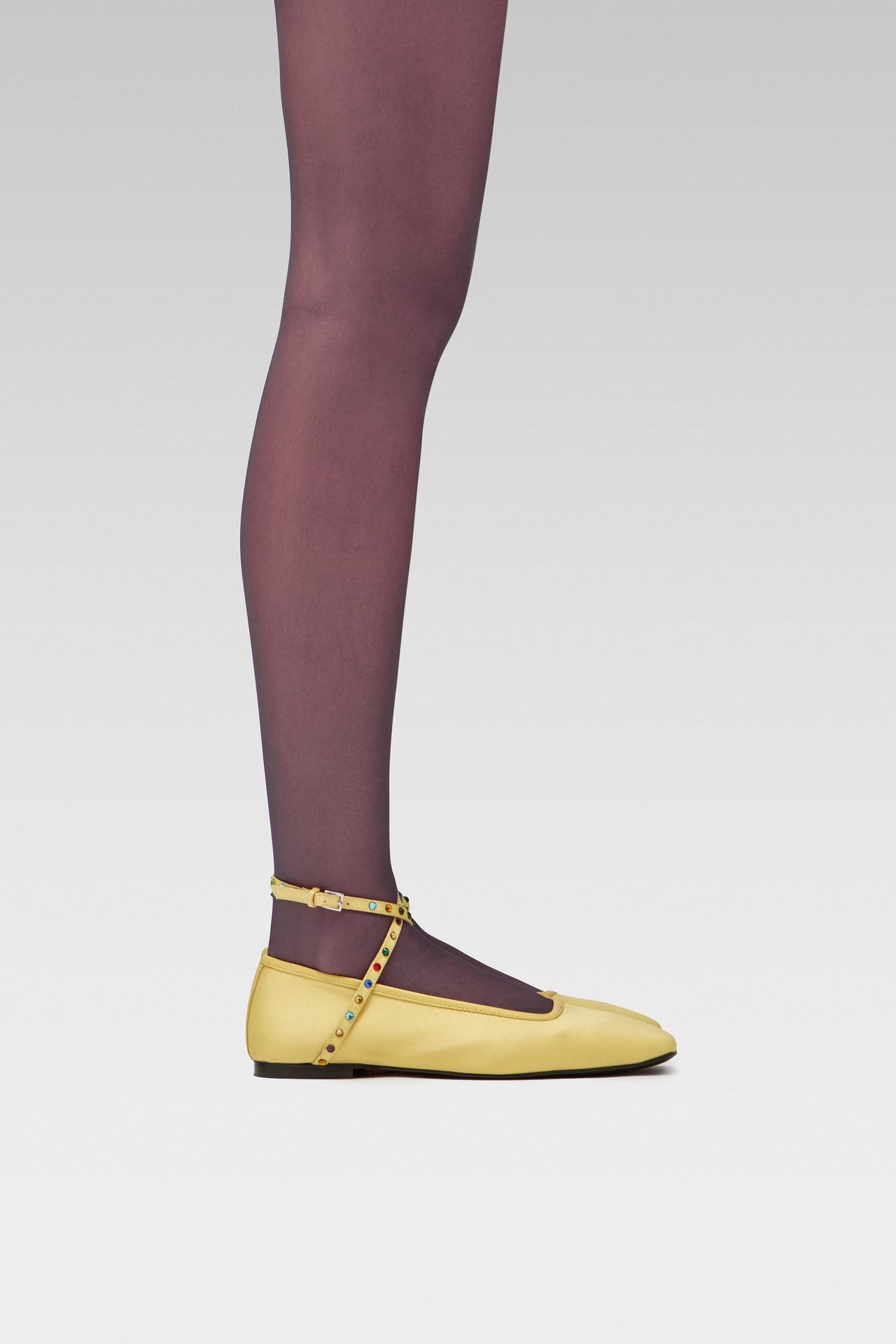 EDLA Galaxy Purple tights with EDLA Yellow Saturn ballet Flat Crafted from butter yellow satin, the Saturn Ballet Flat features multicolored crystal-embellished straps and a squared toe.
