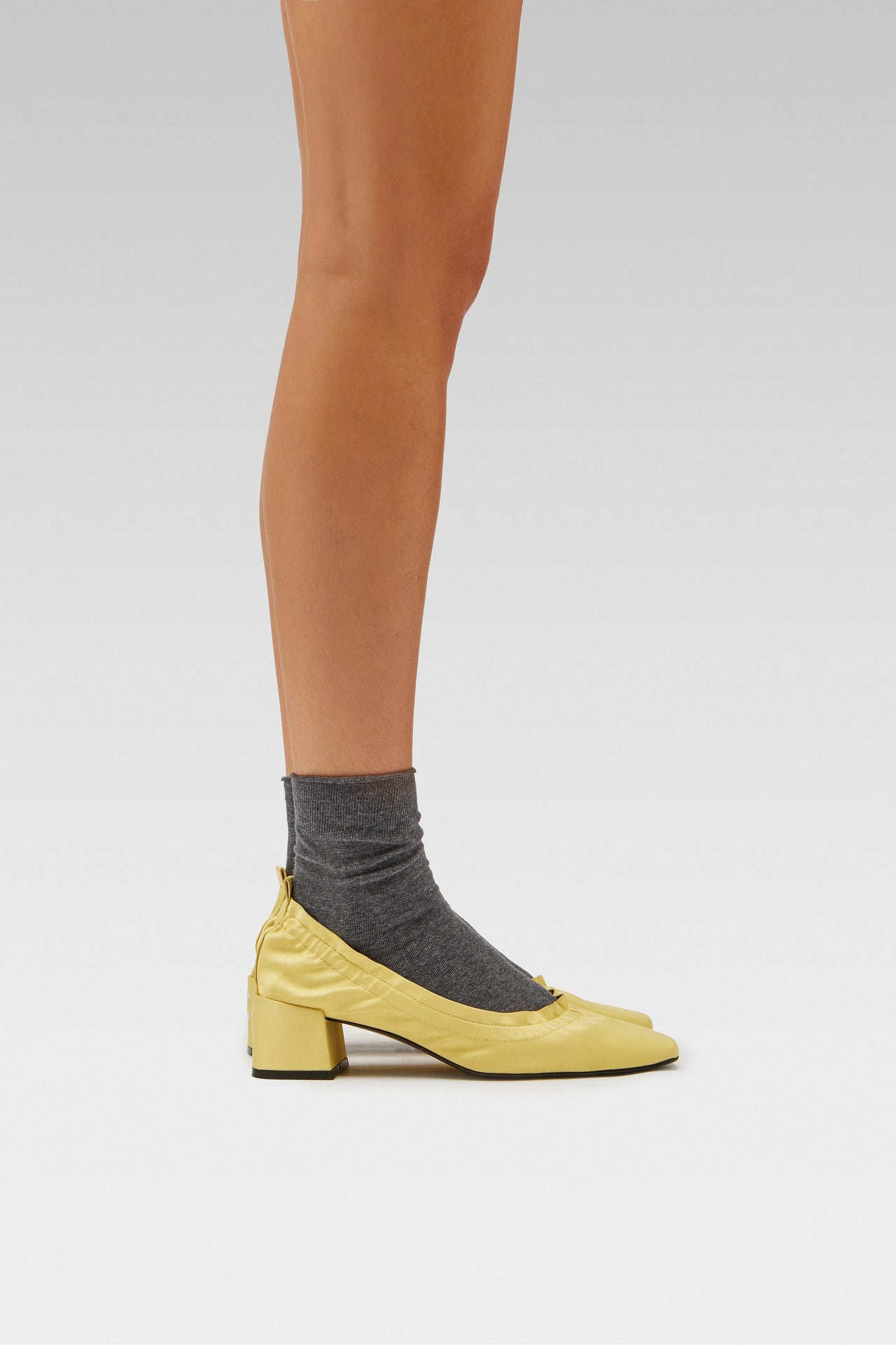 EDLA Ursa grey socks with EDLA yellow Mercury Kitten heel for women crafted in satin, the Mercury Kitten Heel features a ruched edge, squared toe, and a 5cm block heel.