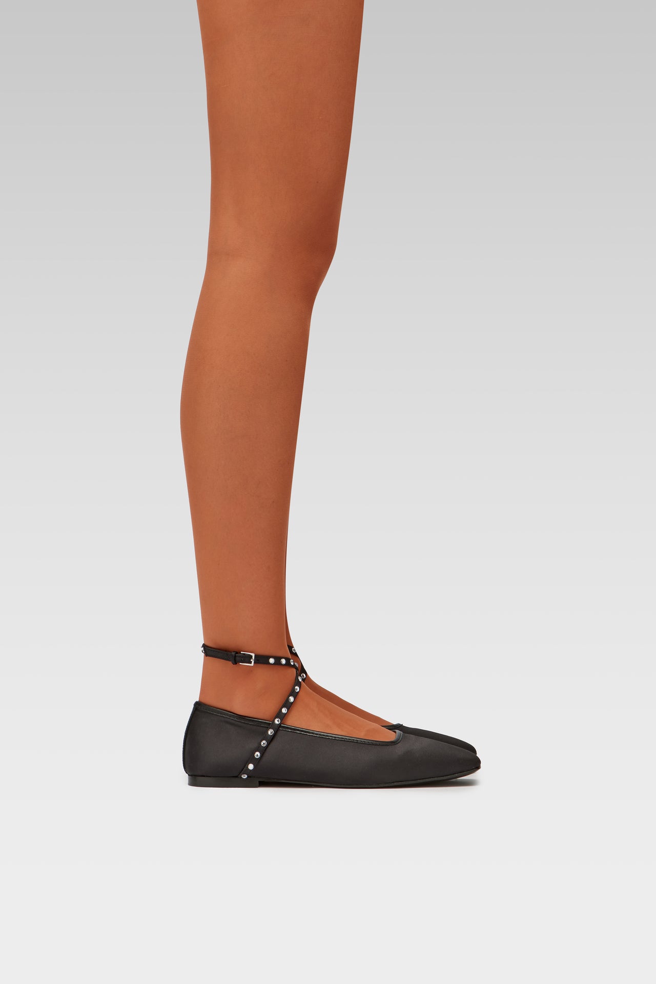 EDLA Galaxy Terracota Orange tights with EDLA Saturn Black ballet flats Crafted from satin, the Saturn Ballet Flat features crystal-embellished straps and a squared toe.