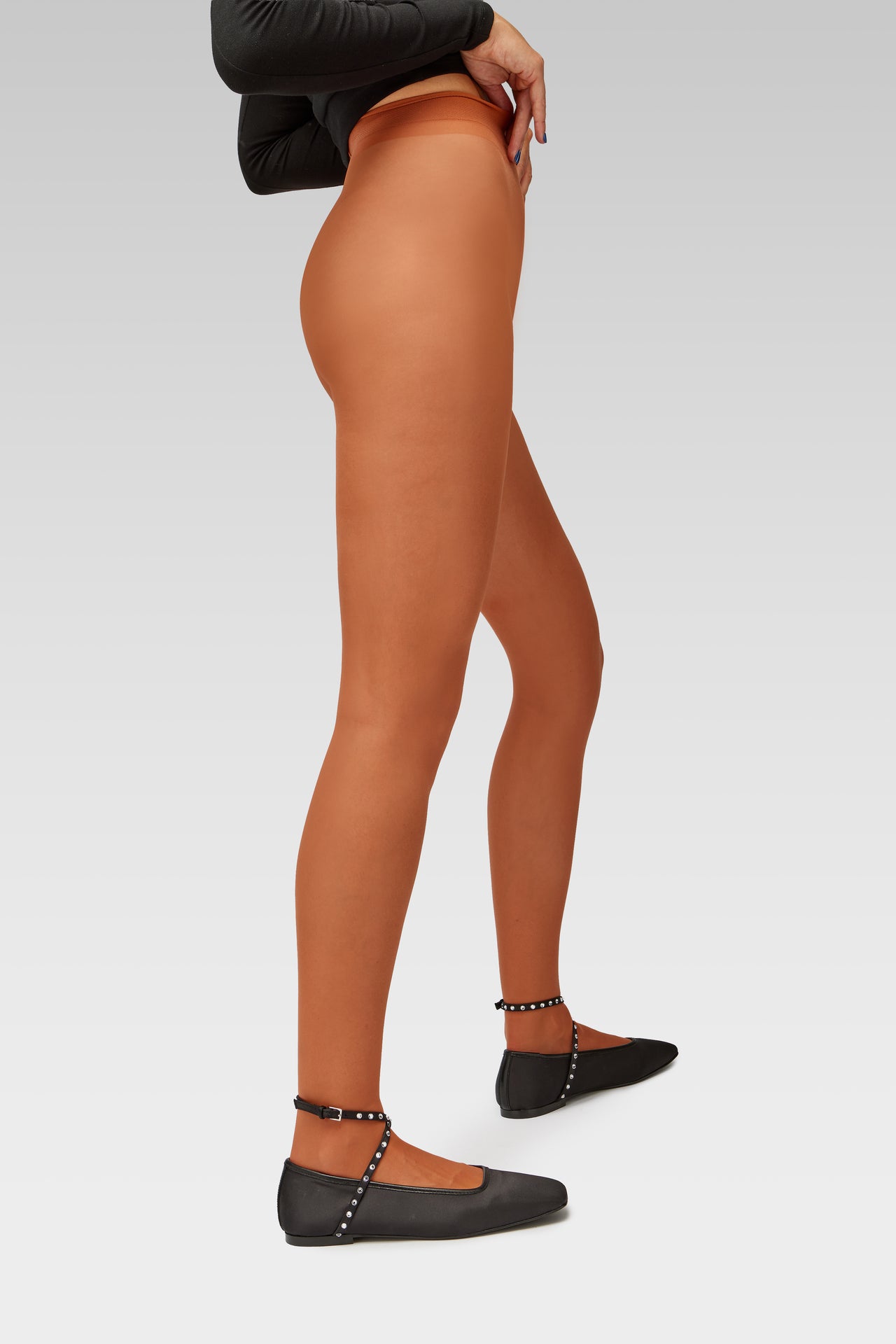 EDLA Galaxy Terracota Orange tights with EDLA Saturn Black ballet flats Crafted from satin, the Saturn Ballet Flat features crystal-embellished straps and a squared toe.