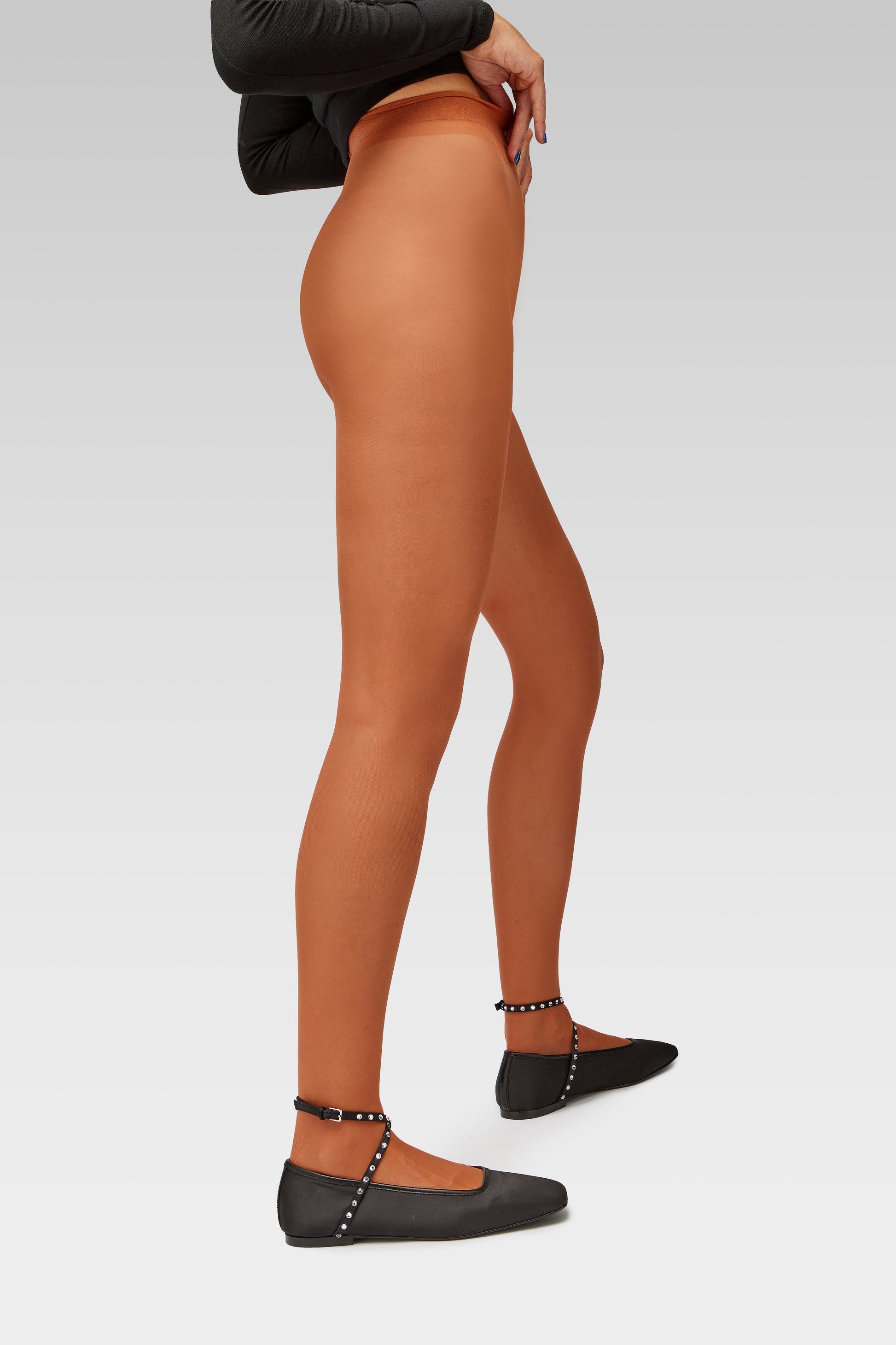 EDLA Galaxy Terracota Orange tights with EDLA Saturn Black ballet flats Crafted from satin, the Saturn Ballet Flat features crystal-embellished straps and a squared toe.