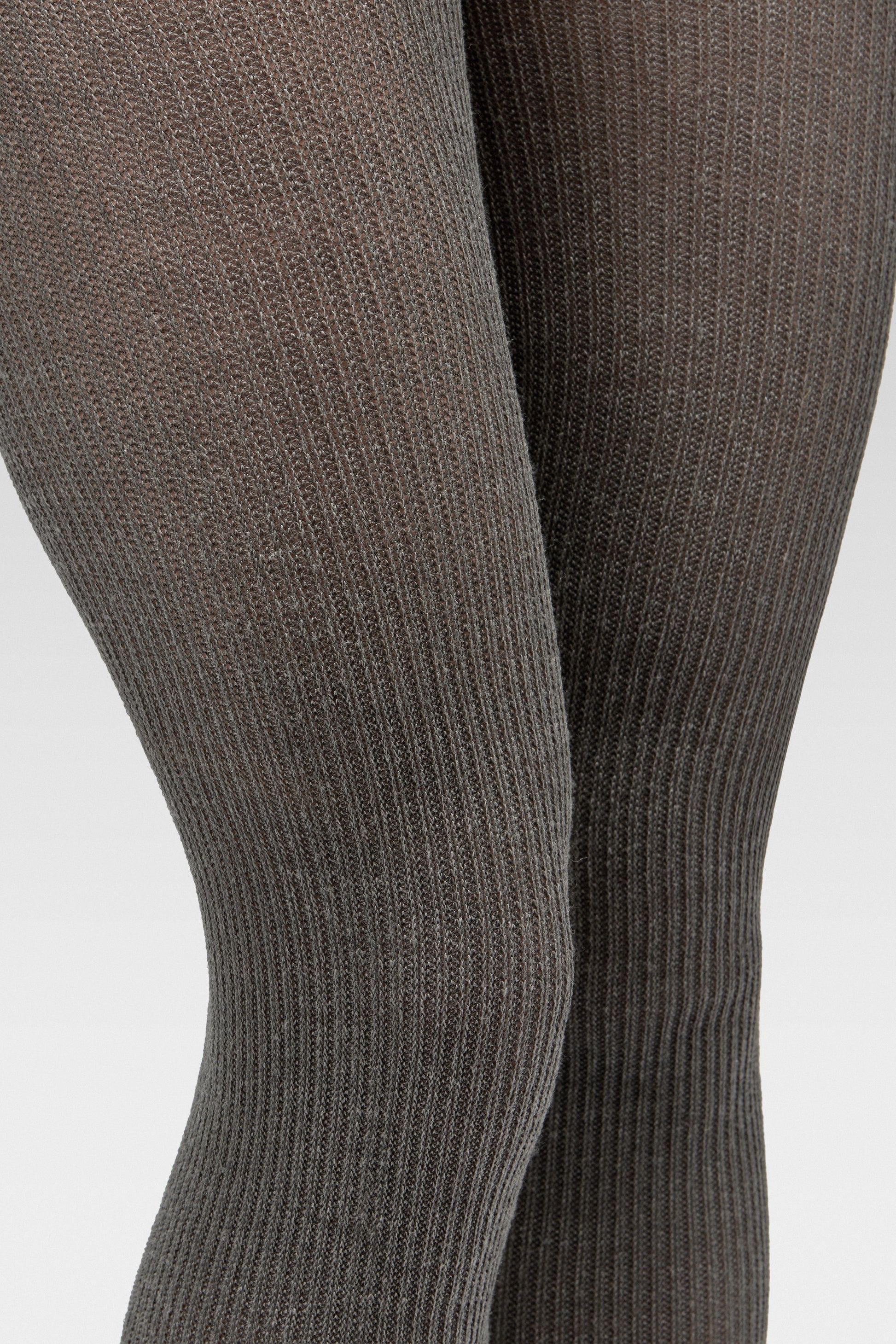 EDLA Cosmo Ribbed Wool Tights detailed fabric close-up.